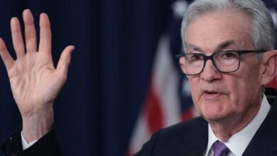 Federal Reserve Maintains High Interest Rates, Hints at Future Cuts