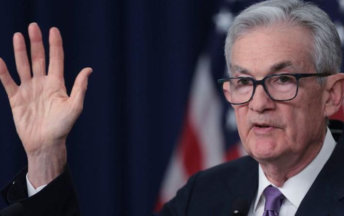 Federal Reserve Maintains High Interest Rates, Hints at Future Cuts