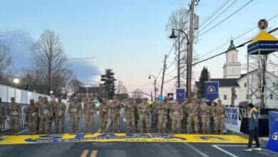 Military Marchers Kick Off the 128th Boston Marathon from Hopkinton