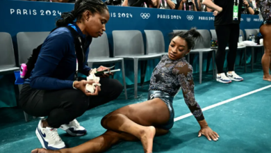 Simone Biles Overcomes Calf Pain to Shine in Qualifiers