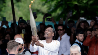 Snoop Dogg Carries Olympic Torch Ahead of Paris Opening Ceremony