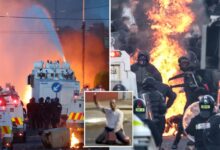 Belfast police blast water cannons at protesters as unrest flares after stabbing Belfast police blast water cannons at protesters as unrest flares after stabbing